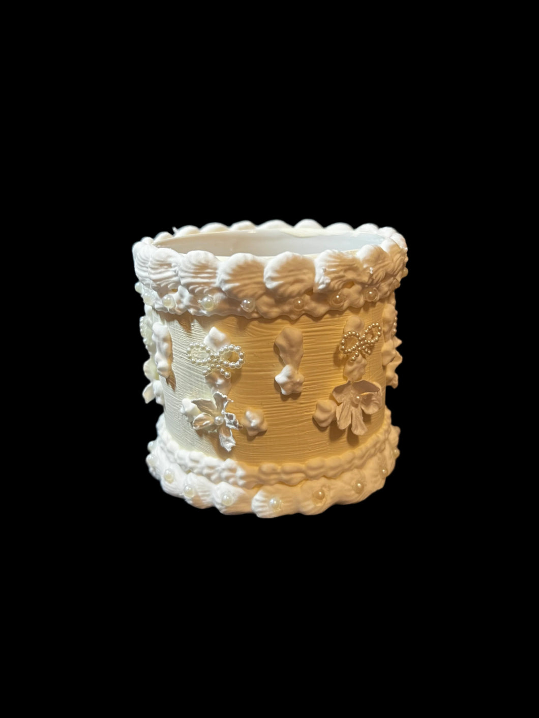 buttercream faux cake planter.