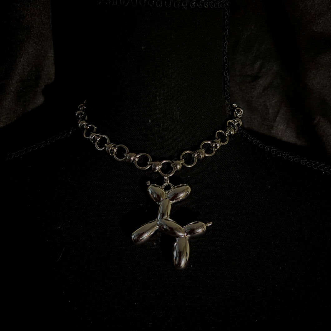 balloon dog necklace.
