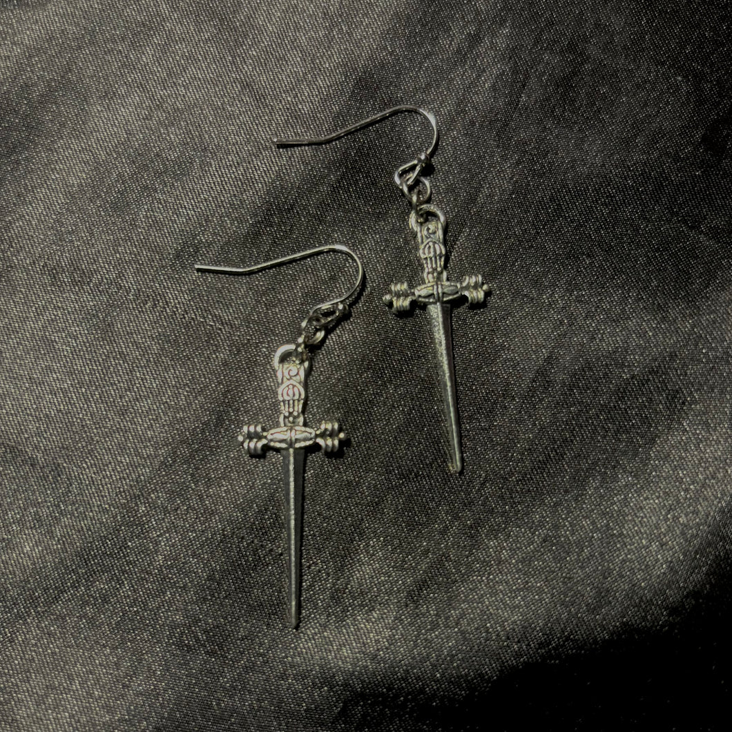 dagger earrings.