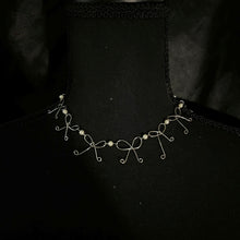 Load image into Gallery viewer, metal bow necklace.
