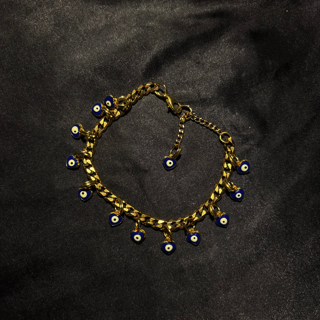 gold evil eye charm bracelet.