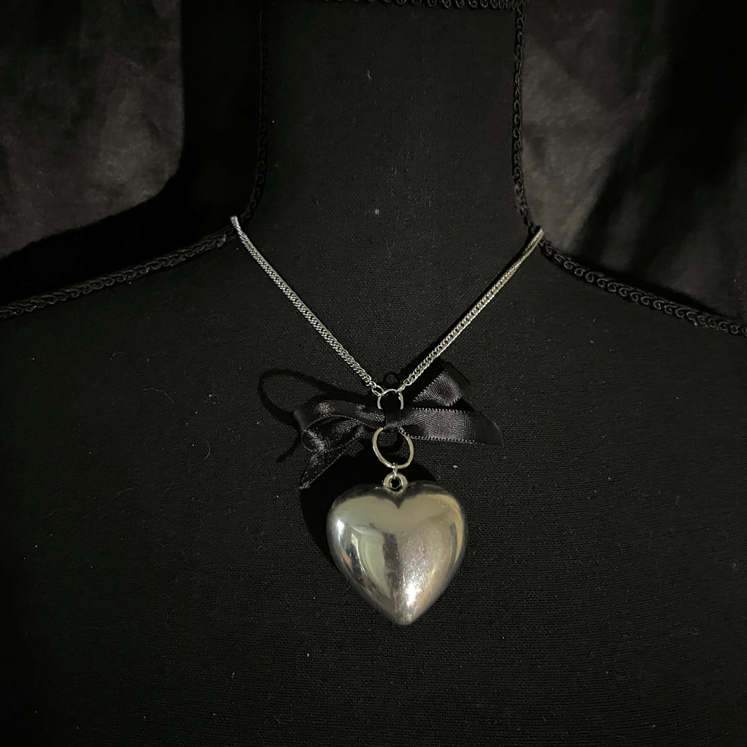 uneasy hearts necklace.