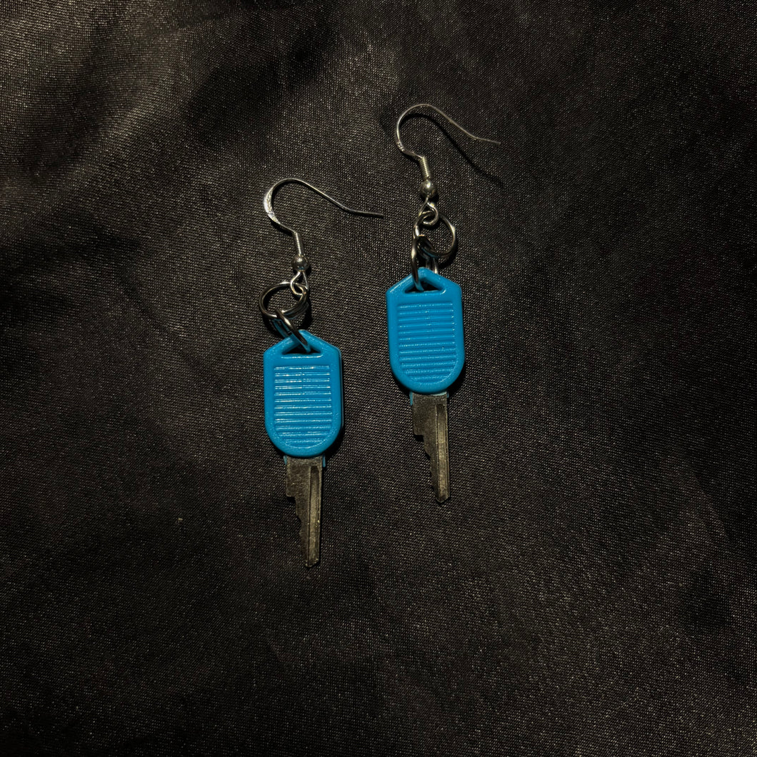 blue key earrings.