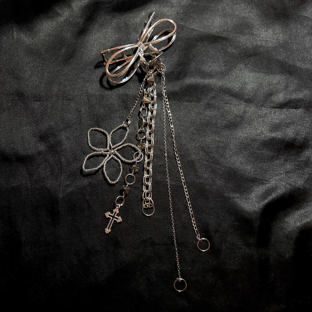 silver flora hair clip.